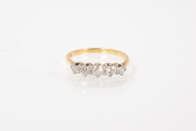 Lot 554 - Edwardian diamond five stone ring with five old cut diamonds in platinum claw setting on gold shank