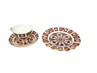 Lot 919 - Royal Crown Derby Old Imari 1128 breakfast cup and saucer, and a wavy edged plate, both in original boxes