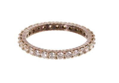 Lot 595 - Diamond eternity ring