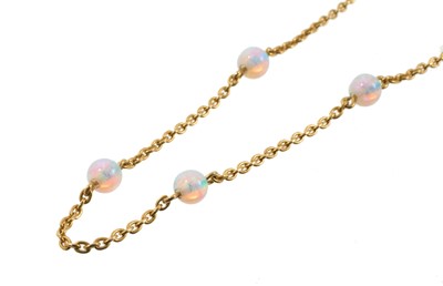 Lot 569 - Edwardian 15ct gold and opal bead necklace