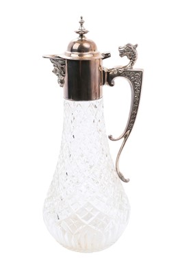 Lot 335 - Cut glass claret jug with silver mounts