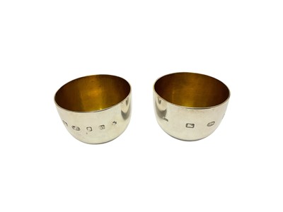 Lot 341 - Pair of silver tumble cups with gilded bowls, Linden & Co, London Silver Vaults