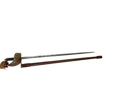 Lot 689 - First World War 1897 pattern Infantry officers' sword with engraved blade in brown pig skin leather field service scabbard.