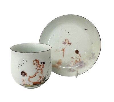 Lot 151 - A rare Chelsea bell shaped coffee cup and saucer, painted with children and putti, circa 1755