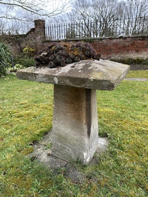 Lot 1500 - 19th century staddle stone with square tapered top on a tapered base, 71cm high