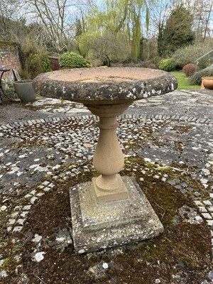 Lot 1504 - Antique style garden bird bath, on baluster column and square stepped base, 81cm high overall