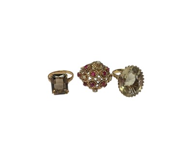 Lot 131 - Three gold gem set cocktail rings
