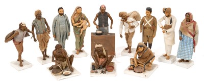 Lot 834 - Group of twelve Indian Company School terracotta figures, depicting various trades