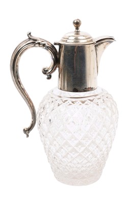Lot 359 - Silver mounted cut glass claret jug