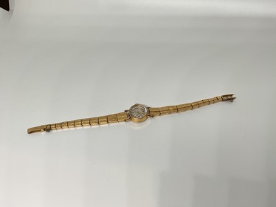 Lot 67 - 1950s ladies gold wristwatch on gold bracelet