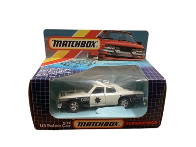 Lot 1736 - Matchbox Superkings Ford Sierra XR4i No.K-100, VW Golf No.K-86 & US Police Car No.K-78, all with trilingual window boxes (3)