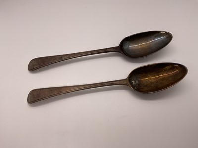 Lot 36 - Pair of George III silver feather edge Old English pattern table spoons