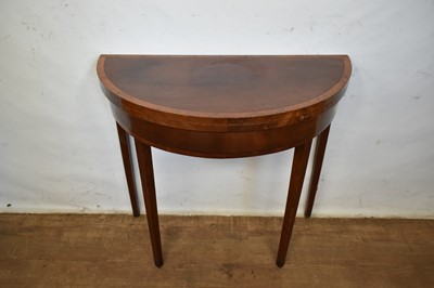 Lot 1372 - George III mahogany and barber pole strung inlaid demi-lune card table