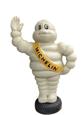 Lot 5 - Reproduction cast metal model of Mr Bibendum (The Michelin man), 23cm in overall height.