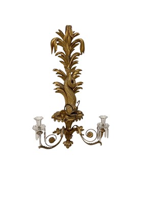 Lot 1446 - Impressive late 18th / early 19th century gilt wall applique of large size, with dolphin and foliate support issuing twin scrolling candle arms with prismatic drops, 102cm high