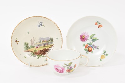 Lot 128 - Late 18th/early 19th century Berlin porcelain cup and saucer, painted with flowers, and a Frankenthal saucer (3)