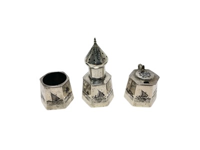 Lot 343 - Middle Eastern (possibly Egyptian) silver and niello three piece cruet set.