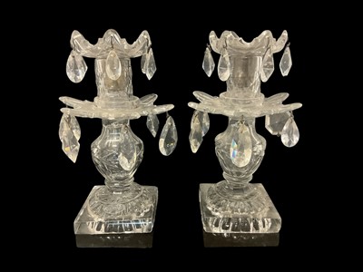 Lot 93 - Pair of 19th century glass lustre candlesticks, on square bases, 20.25cm high