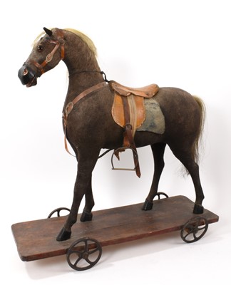 Lot 879 - Late 19th / early 20th century child's pull along horse