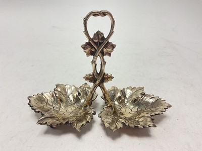 Lot 245 - Spanish silver condiment/ salt dish composed of two vine leaves