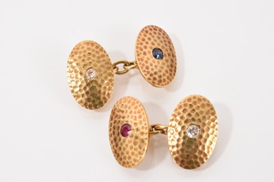 Lot 628 - Pair of 18ct gold diamond, sapphire and ruby cufflinks, in a Garrard box