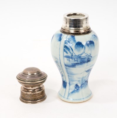 Lot 125 - 18th century Chinese blue and white porcelain vase, the moulded baluster body painted with landscape panels, with white metal mount, 17.5cm high
