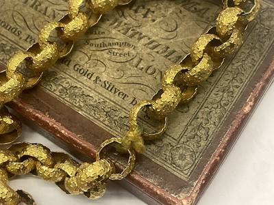Lot 520 - Regency yellow metal chain with large belcher links decorated with stars, the barrel clasp with cannetille work decoration and oval mixed cut pink stones