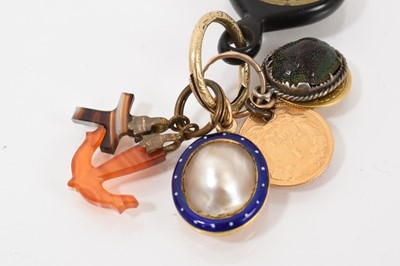 Lot 523 - Group of antique fobs on a gold split ring