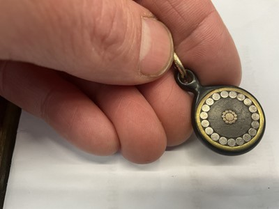 Lot 523 - Group of antique fobs on a gold split ring