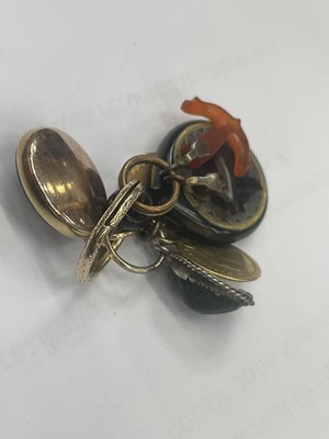 Lot 523 - Group of antique fobs on a gold split ring