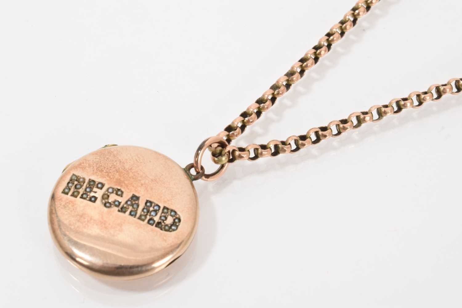 Lot 527 - Victorian gilt metal and seed pearl 'Regard' locket pendant on 9ct gold belcher link chain with barrel clasp