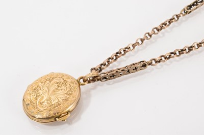 Lot 528 - Victorian gold oval locket with rope twist decoration and applied anchor, on yellow metal fancy link chain