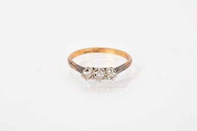 Lot 532 - Diamond three stone ring with three old cut diamonds in platinum claw setting on 18ct gold shank