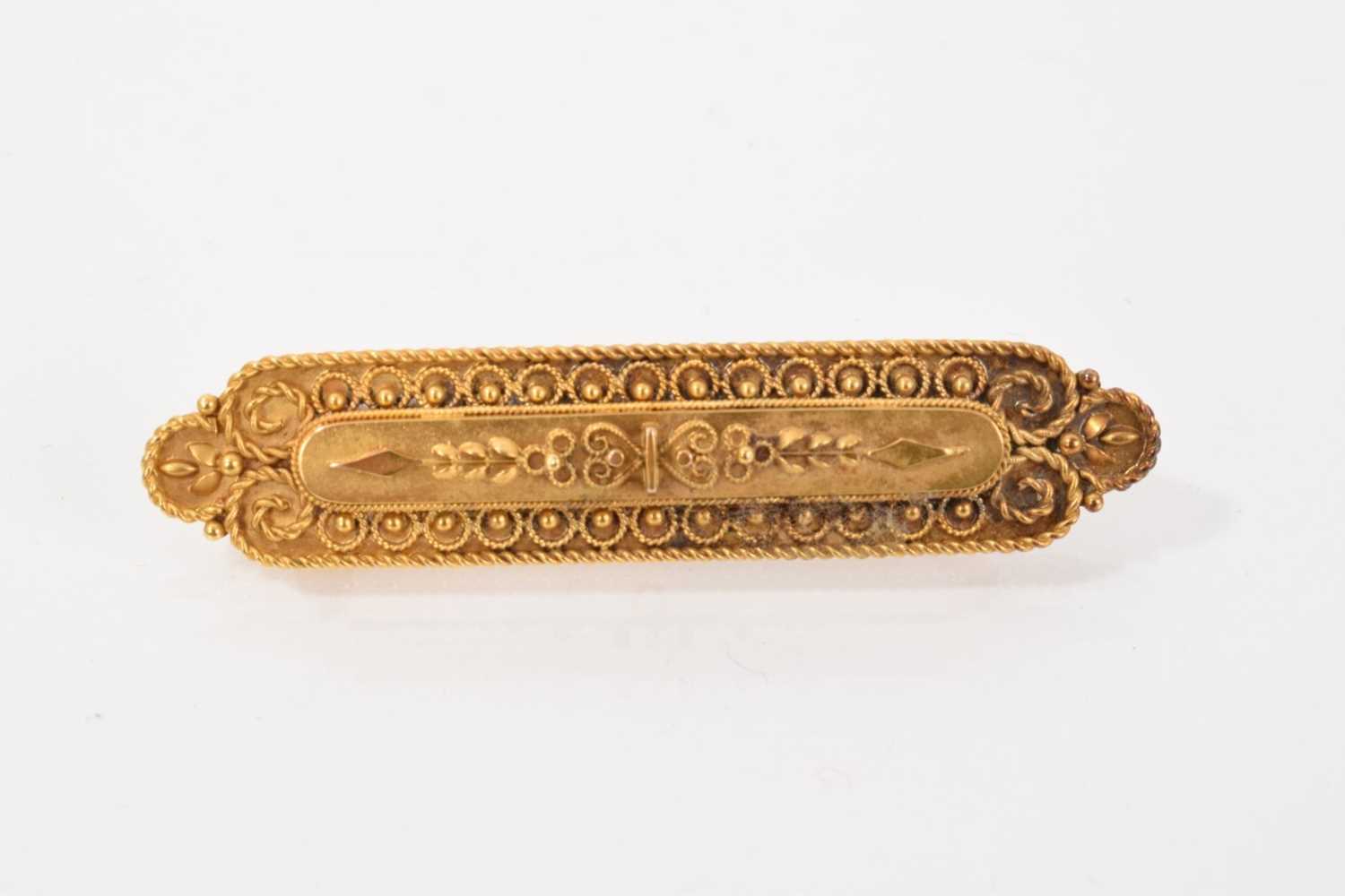 Lot 533 - Victorian 15ct gold brooch with applied filigree decoration