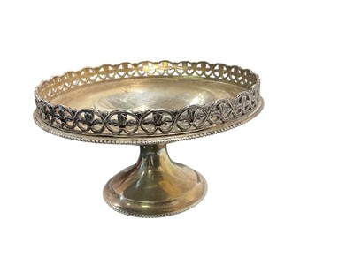 Lot 110 - George V silver bon bon dish with pierced border, raised on a pedestal foot, (London 1930), maker Blackmore & Fletcher Ltd, 13cm in diameter, 7ozs.