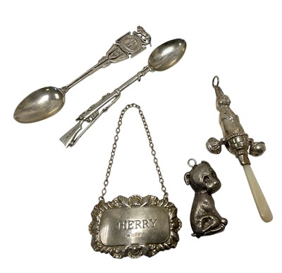 Lot 112 - George V silver babies rattle in the form of a rabbit, (Birmingham 1914), together with another rattle (marks rubbed), a silver Sherry label and two silver teaspoons