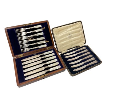 Lot 146 - Set of six silver handled Kings pattern tea knives in a fitted case (Sheffield, various dates), together with a set of six silver plated mother of pearl handled knives and forks in a wooden case.