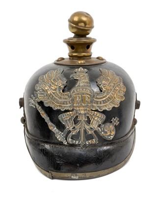 Lot 108 - First World War Imperial German Prussian Artillery Other Rank Picklehaube helmet, with a Prussian eagle plate to front and black leather headband.