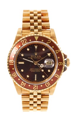 Lot 692 - Rolex GMT Master with box and papers