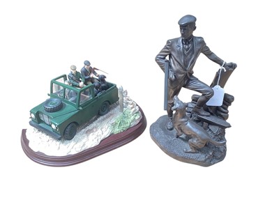 Lot 775 - Two sporting themed resin figures