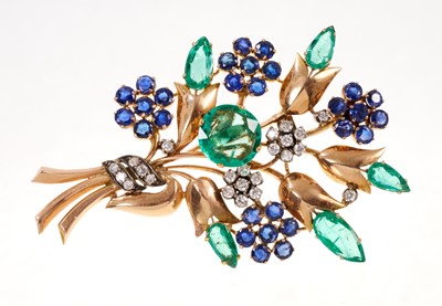 Lot 621 - 1950s emerald, diamond and sapphire floral spray brooch