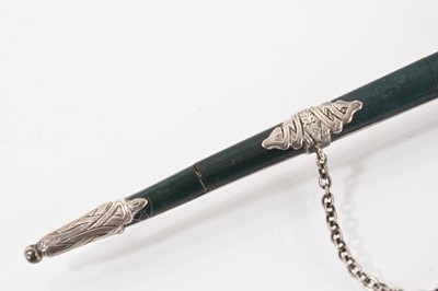 Lot 546 - Scottish silver and bloodstone sword brooch with enamel decoration to the hilt, 9.5cm long