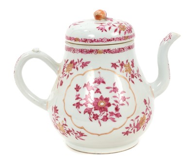 Lot 166 - A large Chinese porcelain teapot and cover, probably early 19th century, painted in puce enamel and gilt with floral patterns, 19.5cm high x 23cm spout to handle