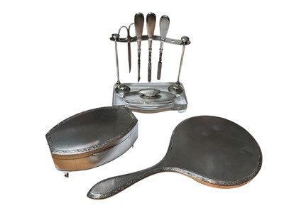 Lot 21 - Mappin & Webb silver jewellery box, matching silver backed dressing table mirror and silver mounted manicure set
