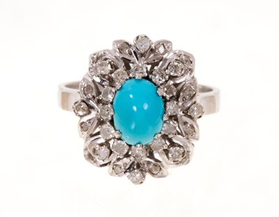 Lot 575 - Turquoise and diamond cluster ring with a central oval turquoise cabochon surrounded by single cut and rose cut diamonds in a continental white gold setting