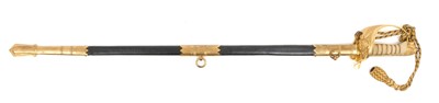 Lot 67 - Good George VI Naval Officer's dress sword with gilt lion's head pommel, wire bound shagreen grips, Gothic guard with crowned fouled anchor and original bullion dress knot, etched fullered blade...
