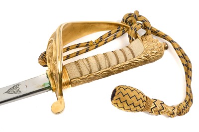 Lot 67 - Good George VI Naval Officer's dress sword with gilt lion's head pommel, wire bound shagreen grips, Gothic guard with crowned fouled anchor and original bullion dress knot, etched fullered blade...