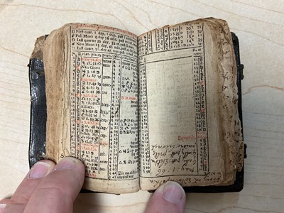 Lot 70 - 17th century Goldsmith's pocket Almanack dated 1658, in original tooled leather binding, a fascinating printed and handwritten account of the daily life of the owner ( apparently un-named) It men...