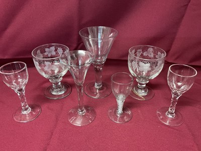 Lot 177 - Group of 18th century drinking glasses, including a pair of facet cut glasses, a plain stem glass, a large plain stem glass, and a continental opaque twist stem glass, together with a pair of 19...