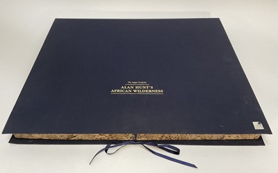Lot 265 - Alan Hunt - African Wilderness, portfolio of 12 images, 39.5cm x 48.5cm unframed, each signed, dated 1998 and numbered from an edition of 950, one framed